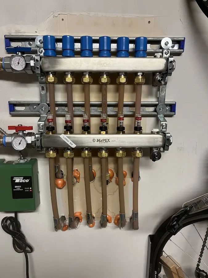 Plumber performing Water Heater Repair at a residential property in Bedminster